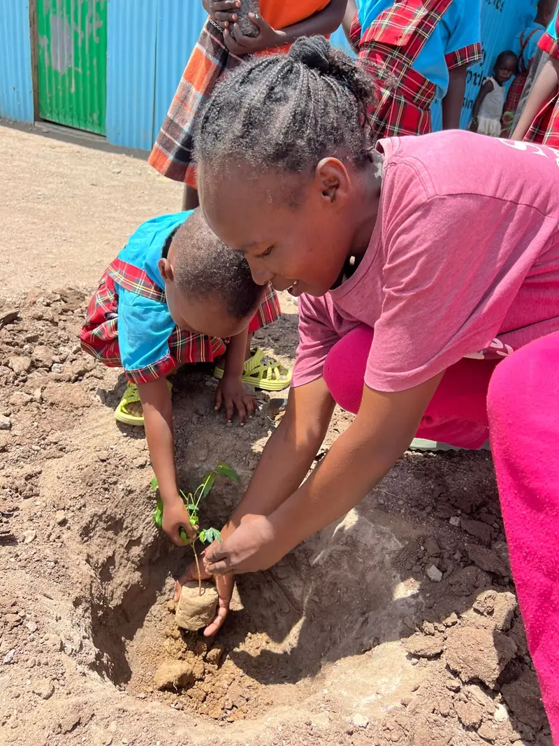 Planting a tree together at Light Academy