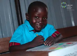 A smiling Light Academy pupil
